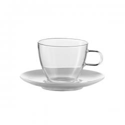 Coffee cup in glass with saucer